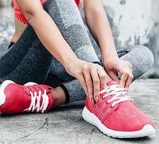 Woman handstand in the water